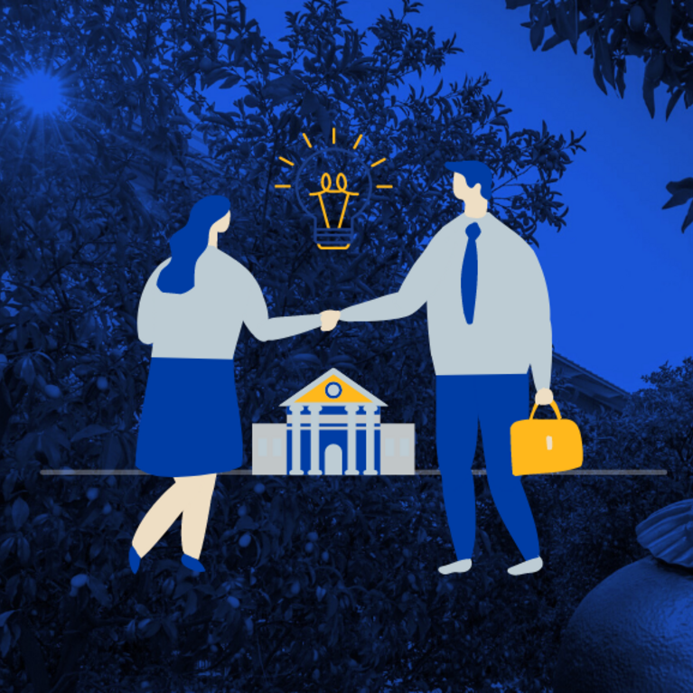 Animated business colleagues shake hands in front of university