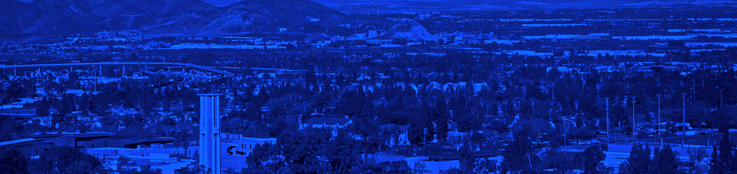 birds-eye view of UCR Campus over blue filter