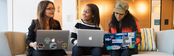 three women at on their laptops