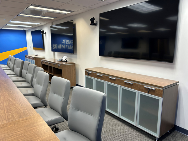 conference room with TV and chairs