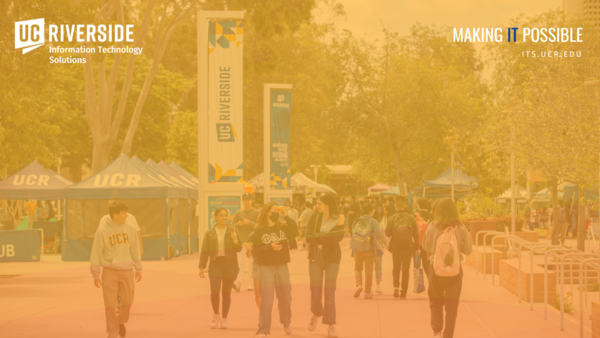 Students walk across campus on busy day