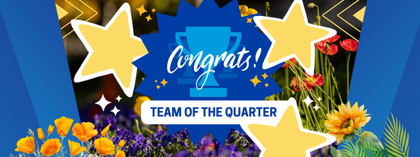 image of a trophy with stars around it and flowers underneath and the words "Congrats! Team of the Quarter" in front