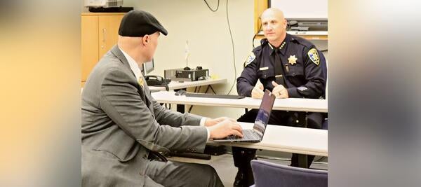 Chief of police speaks to Chief Information Security Officer