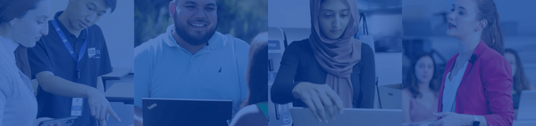 students, faculty, and staff smiling while using technology