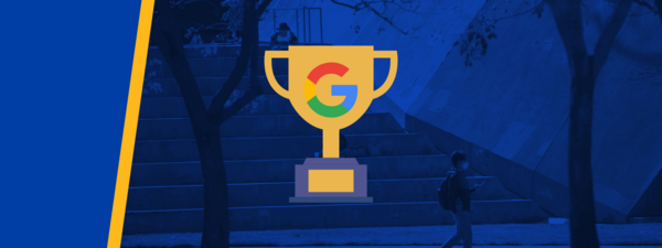 A trophy with a google logo with UCR bell tower in background