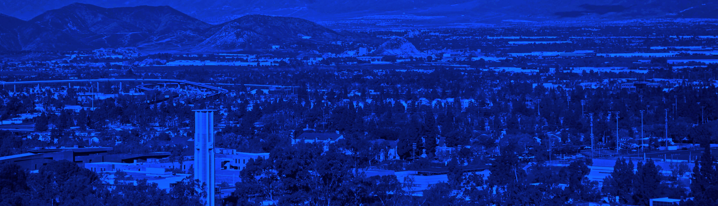 birds-eye view of UCR Campus over blue filter