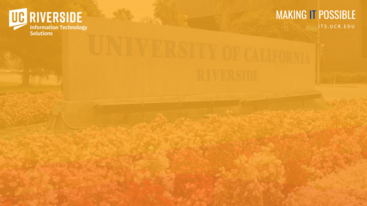 UCR campus signage with flowers